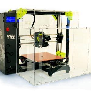 3d printer with a black metal frame and layers of plexiglass windows